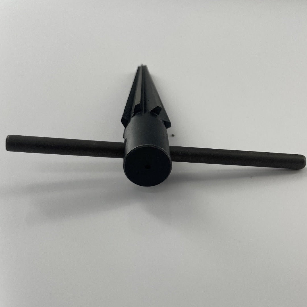 Tapered reamer tool back side