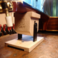Guitar pivoting neck rest in use