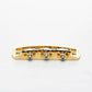 halon offset US-spec bridge back view gold