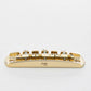 halon metric offset bridge w/ brass saddles front view gold