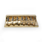 Badass HT1 guitar bridge front flat view gold finish