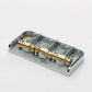 halon half tele bridge with brass saddles angled view chrome