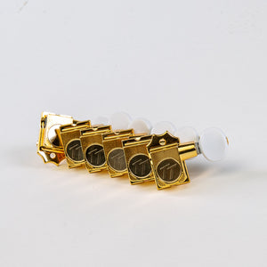 Allparts Top Tier 6 in-line keys w/ white plastic oval buttons set view gold