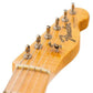guitar headstock view of string tree